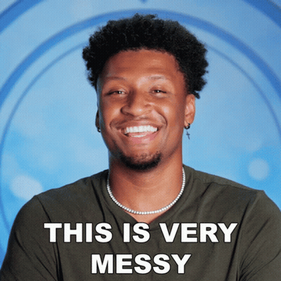 A Man Wearing A Pearl Necklace Smiles With The Caption " This Is Very Messy " GIF