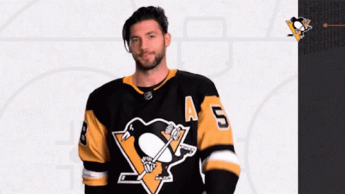 A Man Wearing A Penguins Jersey With The Number 5 GIF