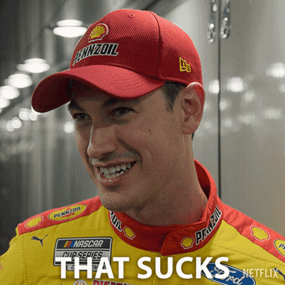 A Man Wearing A Pennzoil Hat Is Smiling And Says That Sucks GIF