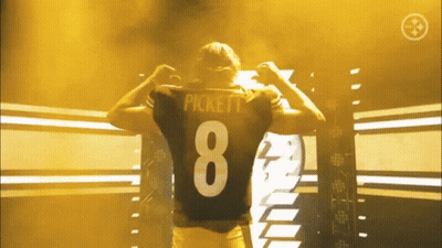 A Man Wearing A Pickett Jersey With The Number 8 GIF