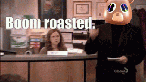 A Man Wearing A Pig Mask Says Boom Roasted While Holding A Piece Of Paper GIF