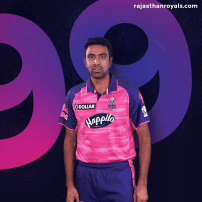 A Man Wearing A Pink And Purple Jersey With Happilo On It GIF