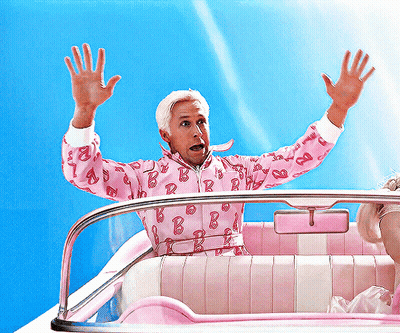 A Man Wearing A Pink Barbie Jacket Is Sitting In A Pink Car GIF