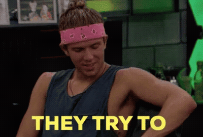 A Man Wearing A Pink Headband And A Blue Tank Top Says They Try To GIF