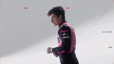 A Man Wearing A Pink Jacket With The Name Franco Colapi GIF