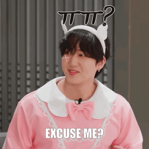 A Man Wearing A Pink Shirt And A White Headband With The Words Excuse Me Written On It GIF