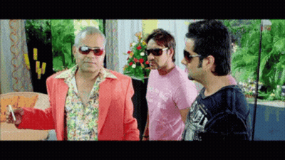 A Man Wearing A Pink Shirt That Says Lonely GIF