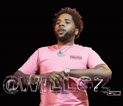 A Man Wearing A Pink Shirt That Says Palacitos On It GIF