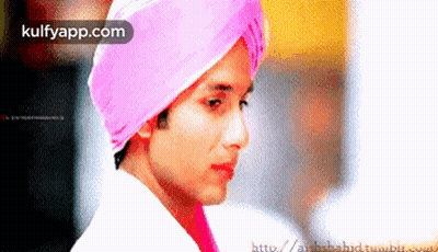 A Man Wearing A Pink Turban With The Website Kulfyapp.com In The Background GIF