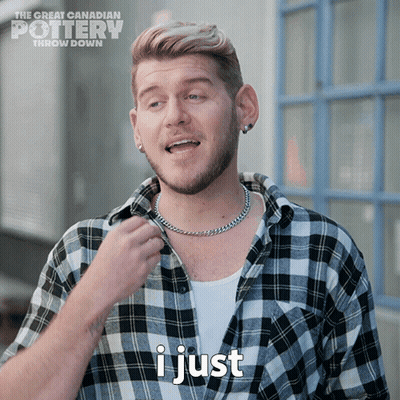 A Man Wearing A Plaid Shirt And A Chain Around His Neck Says I Just GIF