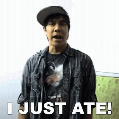 A Man Wearing A Plaid Shirt And A Hat Says " I Just Ate " GIF