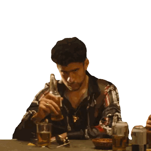 A Man Wearing A Plaid Shirt Is Holding A Glass Sticker