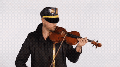 A Man Wearing A Police Hat Plays A Violin GIF