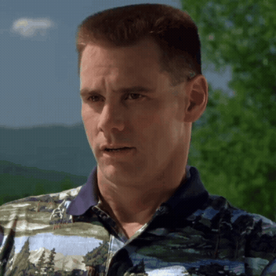 A Man Wearing A Polo Shirt With A Picture Of Trees On It GIF