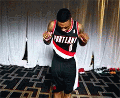 A Man Wearing A Portland Jersey Is Dancing GIF