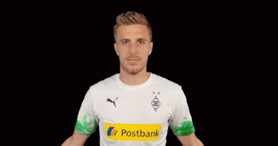 A Man Wearing A Postbank Shirt Holds His Arms Out GIF