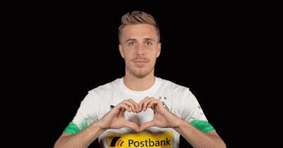 A Man Wearing A Postbank Shirt Making A Heart Shape With His Hands GIF