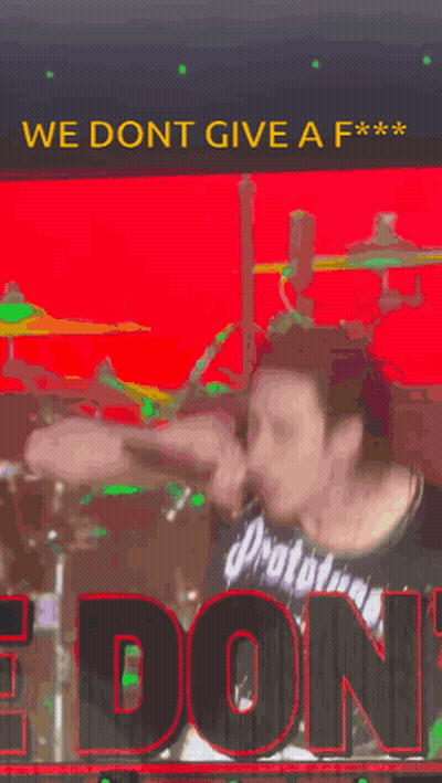 A Man Wearing A Prototypes Jersey Is Singing Into A Microphone . GIF