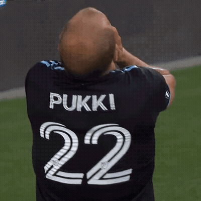A Man Wearing A Pukki 22 Jersey Covers His Face GIF