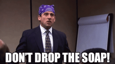 A Man Wearing A Purple Bandana And A Suit Says " Do N't Drop The Soap " GIF