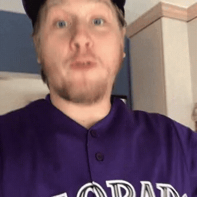 A Man Wearing A Purple Colorado Jersey Looks Surprised GIF