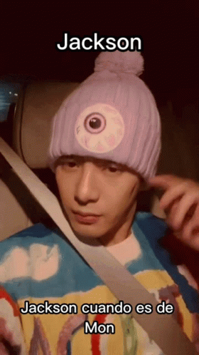 A Man Wearing A Purple Hat With An Eye On It And The Name Jackson On The Bottom GIF