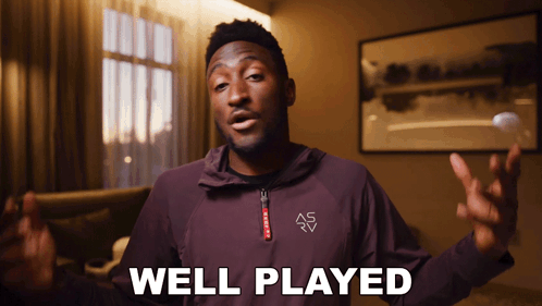 A Man Wearing A Purple Jacket With The Word Well Played On It GIF
