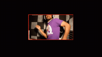 A Man Wearing A Purple Shirt With A Monkey On It Dancing GIF