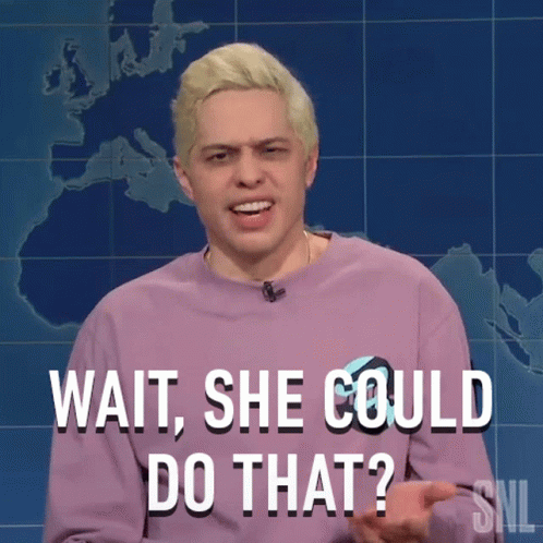 A Man Wearing A Purple Sweater Is Asking Wait She Could Do That GIF