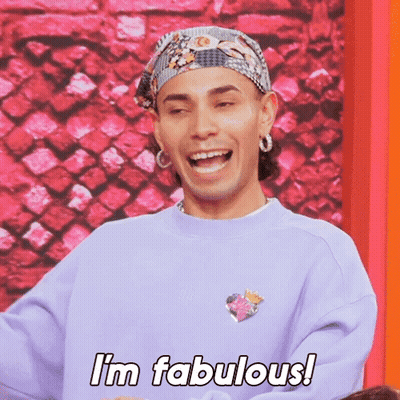 A Man Wearing A Purple Sweatshirt And A Bandana Is Laughing And Saying I 'M Fabulous . GIF