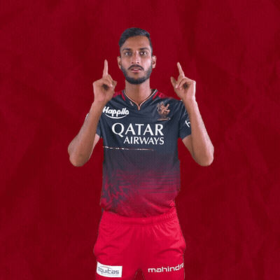 A Man Wearing A Qatar Airways Shirt Holds Up His Arms GIF