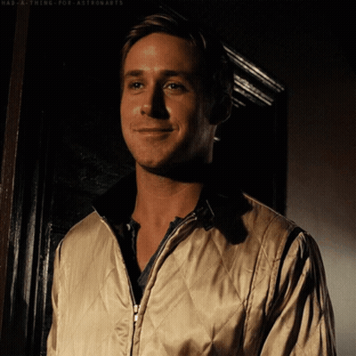 A Man Wearing A Quilted Jacket Is Smiling With The Words Had A Thing For Astronauts Below Him GIF