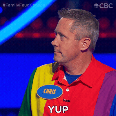 A Man Wearing A Rainbow Shirt Has A Name Tag That Says Chris GIF