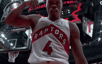 A Man Wearing A Raptors Jersey With The Number 4 GIF