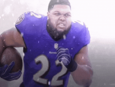 A Man Wearing A Ravens Jersey With The Number 22 On It GIF
