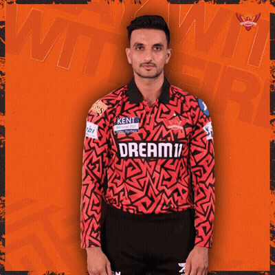 A Man Wearing A Red And Black Jersey That Says Dream11 On It GIF