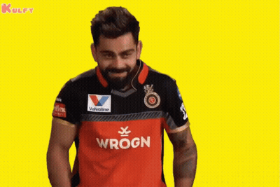 A Man Wearing A Red And Black Wrogn Shirt GIF