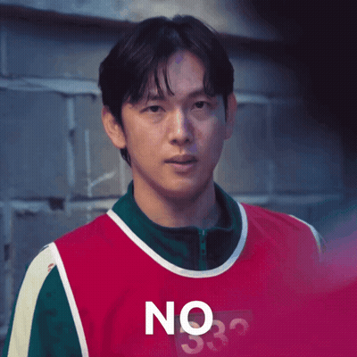 A Man Wearing A Red And Green Shirt With The Number 332 On It GIF
