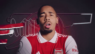 A Man Wearing A Red And White Arsenal Jersey Says I Am GIF