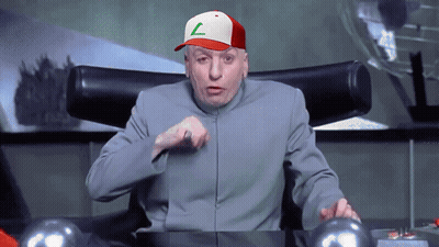 A Man Wearing A Red And White Hat With A Green Letter L On It GIF