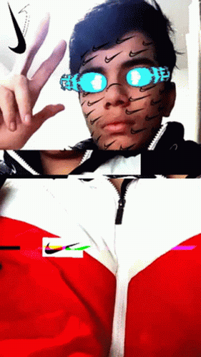 A Man Wearing A Red And White Nike Jacket And Sunglasses GIF