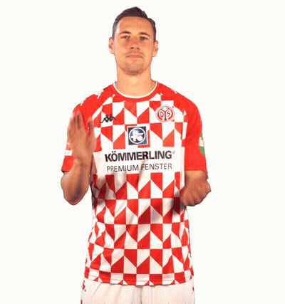 A Man Wearing A Red And White Shirt That Says Kommerling Premium Fenster On It GIF