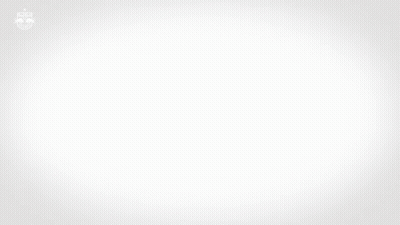 A Man Wearing A Red And White Striped Shirt With A Bull On It GIF