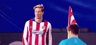 A Man Wearing A Red And White Striped Shirt With Baku 2015 On It GIF