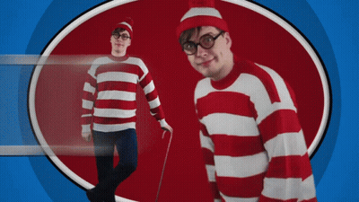 A Man Wearing A Red And White Striped Sweater And Hat GIF