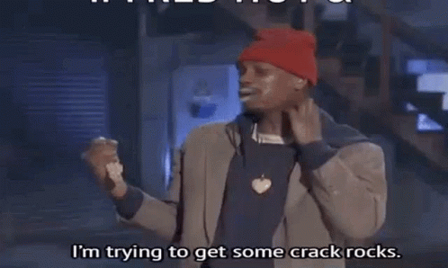 A Man Wearing A Red Beanie And A Brown Jacket Is Saying I 'M Trying To Get Some Crack Rocks GIF