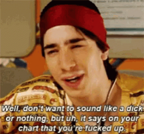 A Man Wearing A Red Beanie And A Yellow Shirt Is Talking About A Dick GIF
