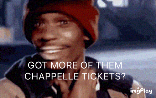 A Man Wearing A Red Beanie Is Smiling And Asking If He Has More Chapelle Tickets GIF