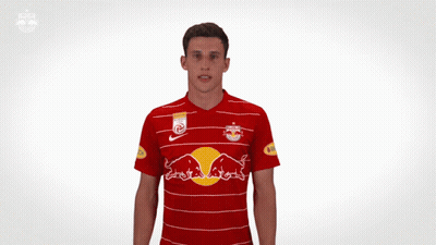 A Man Wearing A Red Bulls Jersey With The Number One On It GIF