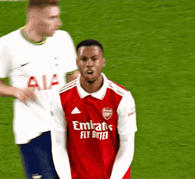A Man Wearing A Red Emirates Fly Better Jersey GIF